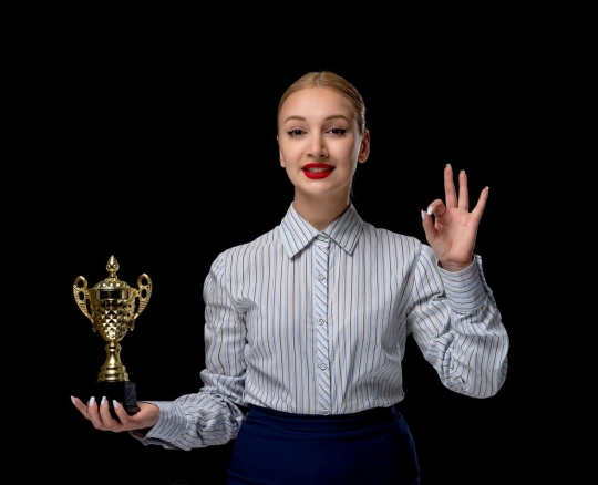 business-woman-blonde-cute-girl-showing-ok-sign-with-trophy-wearing-red-lipstick-office-costume_140725-161346