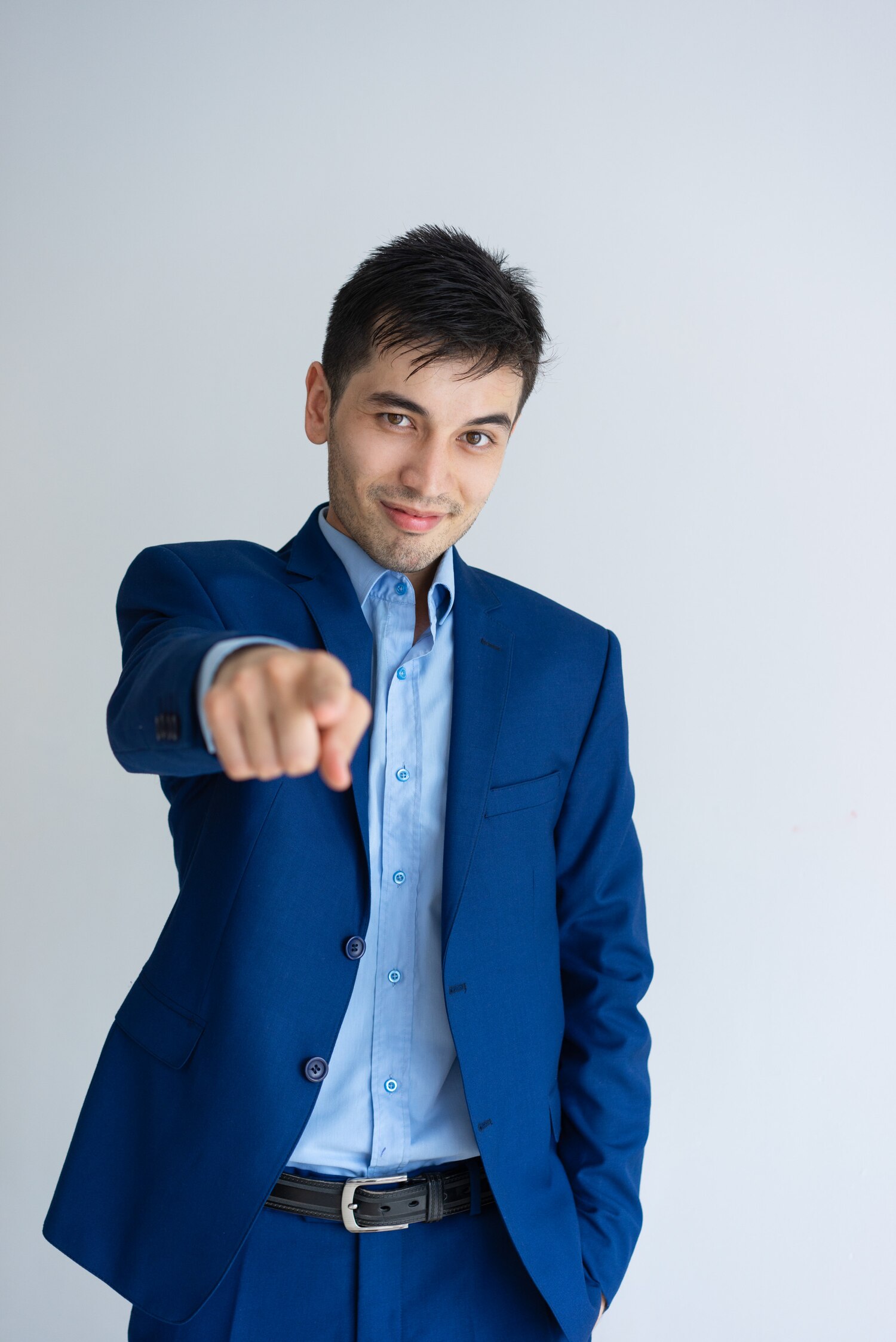 positive-business-man-pointing-you-looking-camera_1262-18278